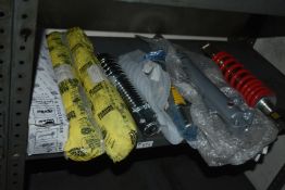 *Contents of Shelf to Include Seven Assorted Motorcycle Shocks