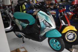 *Piaggio 1 E-Scooter Feng Chen Wang Design with Two Chargers (one EU, one UK), New and