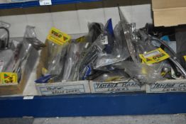 *Contents of Shelf to Include Brake and Clutch Levers, etc.