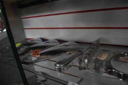 *Contents of Shelf to Include Assorted Chrome Embellishments for Vespas