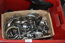 *Box of Clips, Encasing, and Luggage Load