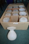 Twelve White Vases
