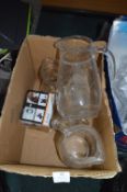 Five Glass Water Jugs and a Five Way Compressor Pu