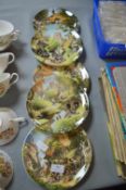 Nine Coalport wall Plates