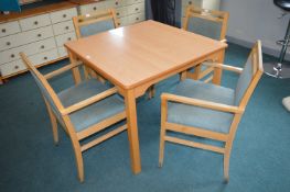 *Square Dining Table and Four Upholstered Chairs