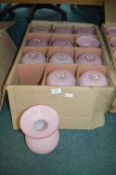 Twelve Pink Glass Vases