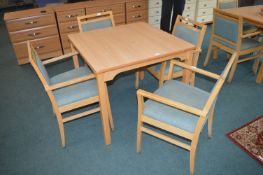 *Square Dining Table and Four Upholstered Chairs