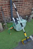 Hozelock Garden Reel and a Rolson Telescopic Brush