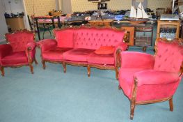 Three Piece Suite with Burgundy Upholstery and Car