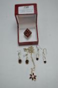 Sterling Silver and Garnet Ring, Pedant, and Two Pairs of Earrings