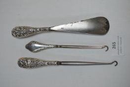 Two Button Hooks and a Shoehorn with Hallmarked Sterling Silver Handles