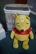 Laundry Basket and a Winnie the Pooh Soft Toy