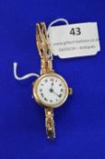 Continental 9ct Gold Lady’s Wristwatch and Strap with Enamel Frace 17g gross