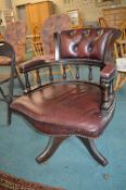 Burgundy Leather Chesterfield Captain's Swivel Chair (one castor requires attention)