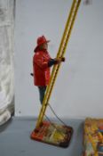 Mar Clockwork Tinplate Climbing Fireman (in working condition)