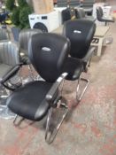 *Two Black Upholstered Chairs on Tubular Chrome Frames