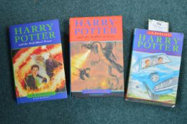 Two First Edition Harry Potter Books and One Other