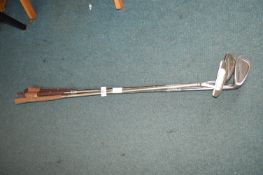 Three Confidence Visa III Golfing Irons and a Vant