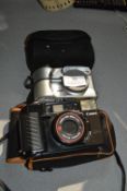 Canon SureShot 35mm Camera and a Toshiba PBR2300 D