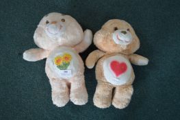 One Peach and One Beige Care Bears