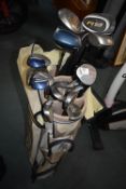 Mixed Bag of Assorted Golf Clubs and a White Hot Putter