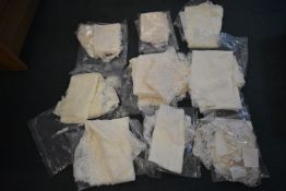 *Nine Packs of Lace and Other Fabrics