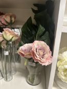 *Glass Vase Containing Artificial Roses and Chef Plant Leaves
