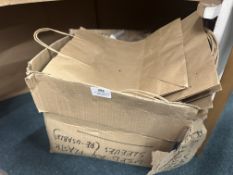 *Box of Brown Paper Bags and Plastic Wallets