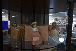 Three Nao Girl Figurines with Packaging