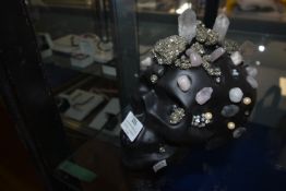 Skeleton Moneybox with Pyrite, Onyx , and Crystal