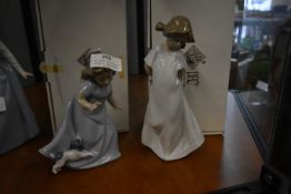 Two Nao Girl Figurines with Packaging