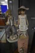 Two Lladro Boy and Girl Figurines