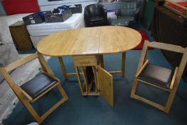 Oval Drop Leaf Table with Storage Compartment for