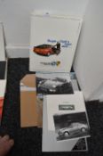 *Collection of Car Memorabilia Including Brochures, Roger Clark’s Open Door, etc.