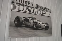 *Unframed Black & White Printed Canvas Depicting an Early F1 Scene of Bruce McLaren