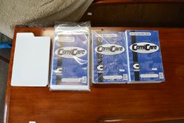 ~18 A4 Dividers, Two Packs of 100 Comicare Polyethene Bags, and ~150 Comicare Vinyl Whiteboards