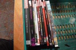 ~12 Marvel Comics and Graphic Novels Including Dr. Strange, and Captain Marvel