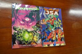 Two DC Graphic Novels Including Justice League, and JSA