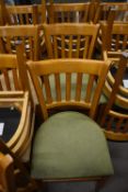 Four Wooden Chairs with Green Upholstered Seats