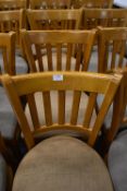 Six Wooden Chairs with Light Brown Upholstered Seats