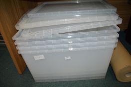 Four Large Lidded Storage Boxes