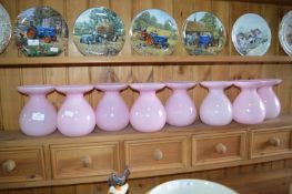 Eight Pink Glass Vases