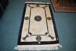 Small Black & White Chinese Rug
