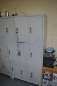 *Bank of Nine Grey Lockers (some with keys)