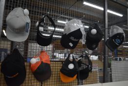 *Ten Assorted Baseball Caps and One Sun Visor