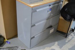 *Three Drawer Lateral Filing Cabinet Containing Various Workwear, Fishing Rod Bags, etc.