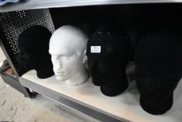 *Three Black and One White Display Heads