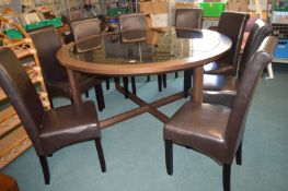Large Circular Dining Table with Eight Faux Leather Chairs