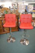 Pair of Red Faux Leather Gas-Lift Barstools on Chrome Bases