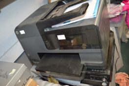 HP OfficeJet Pro H615 Aio Printer, and a Panasonic DVD Player